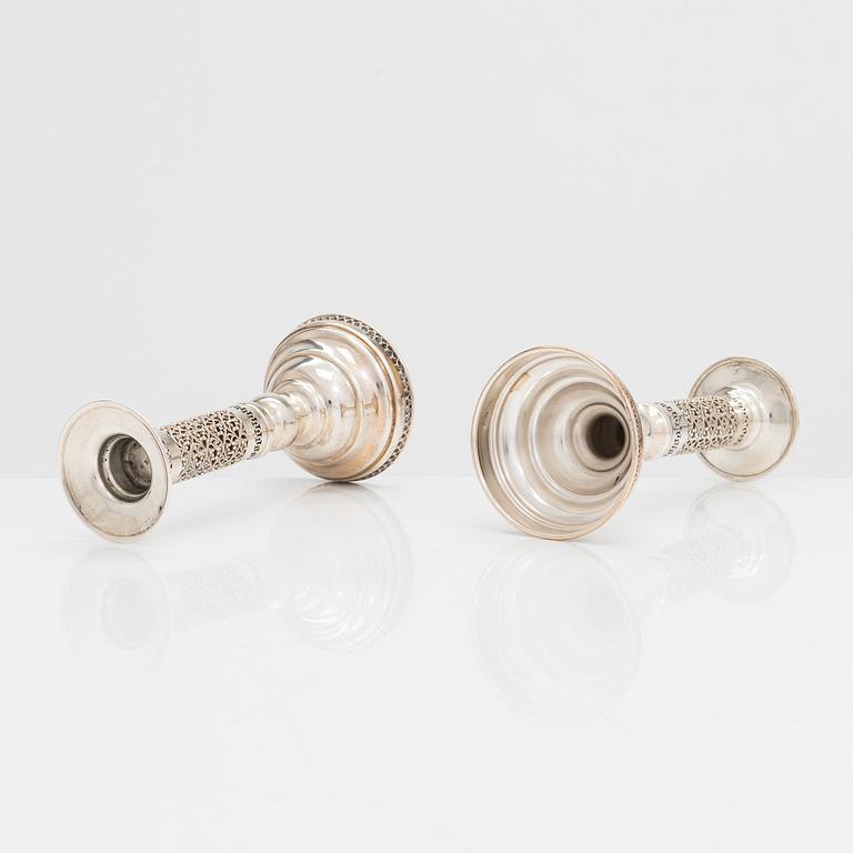 A pair of sterling silver candlesticks, latter half of the 20th century. Unidentified maker's mark.