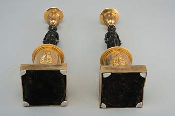 A PAIR OF CANDLESTICKS.