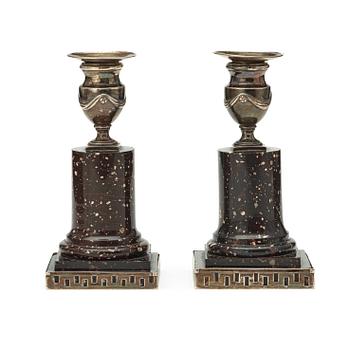 A pair of porphyry and silver candlesticks by Anders Christian Levon, Åbo 1799.