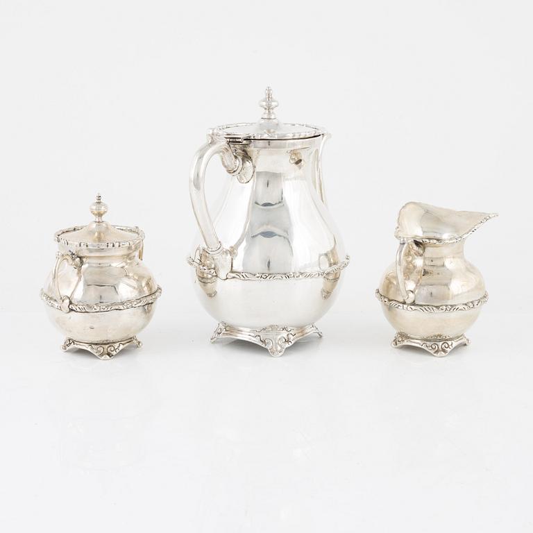 A Mexican Sterling Silver Coffee Pot, Creamer and Sugar Bowl, 20th Century.