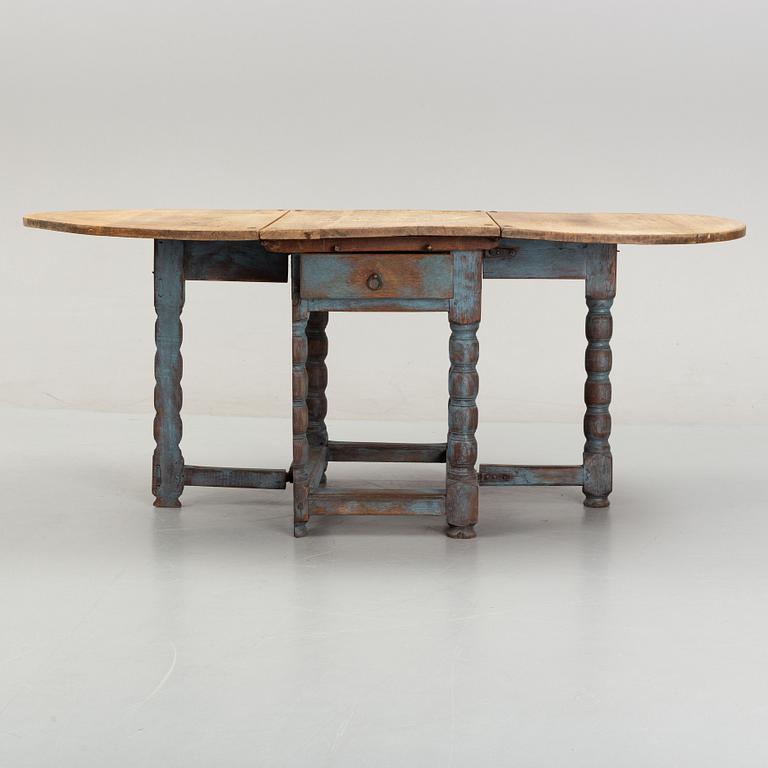 A 19th Century painted gate leg table.