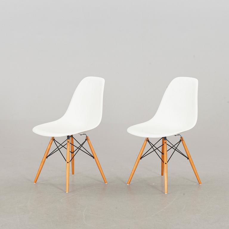 A PAIR OF "PLASTIC CHAIR" BY CHARLES & RAY EAMES, Vitra 2009.