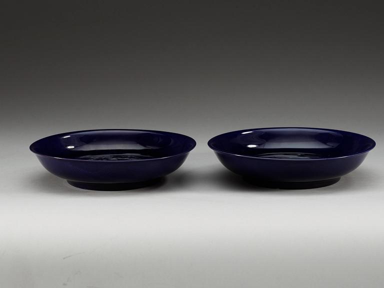 A pair of deep purple glazed dishes, Qing dynasty, with Qianlong six character mark.