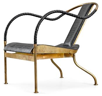 33. A Mats Theselius 'El Rey' brass and black leather easy chair, Källemo, Sweden 1999.