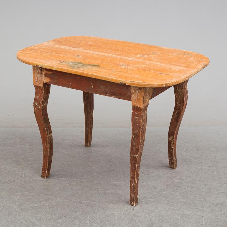 A provincial pine Rococo table, 18th/19th Century.