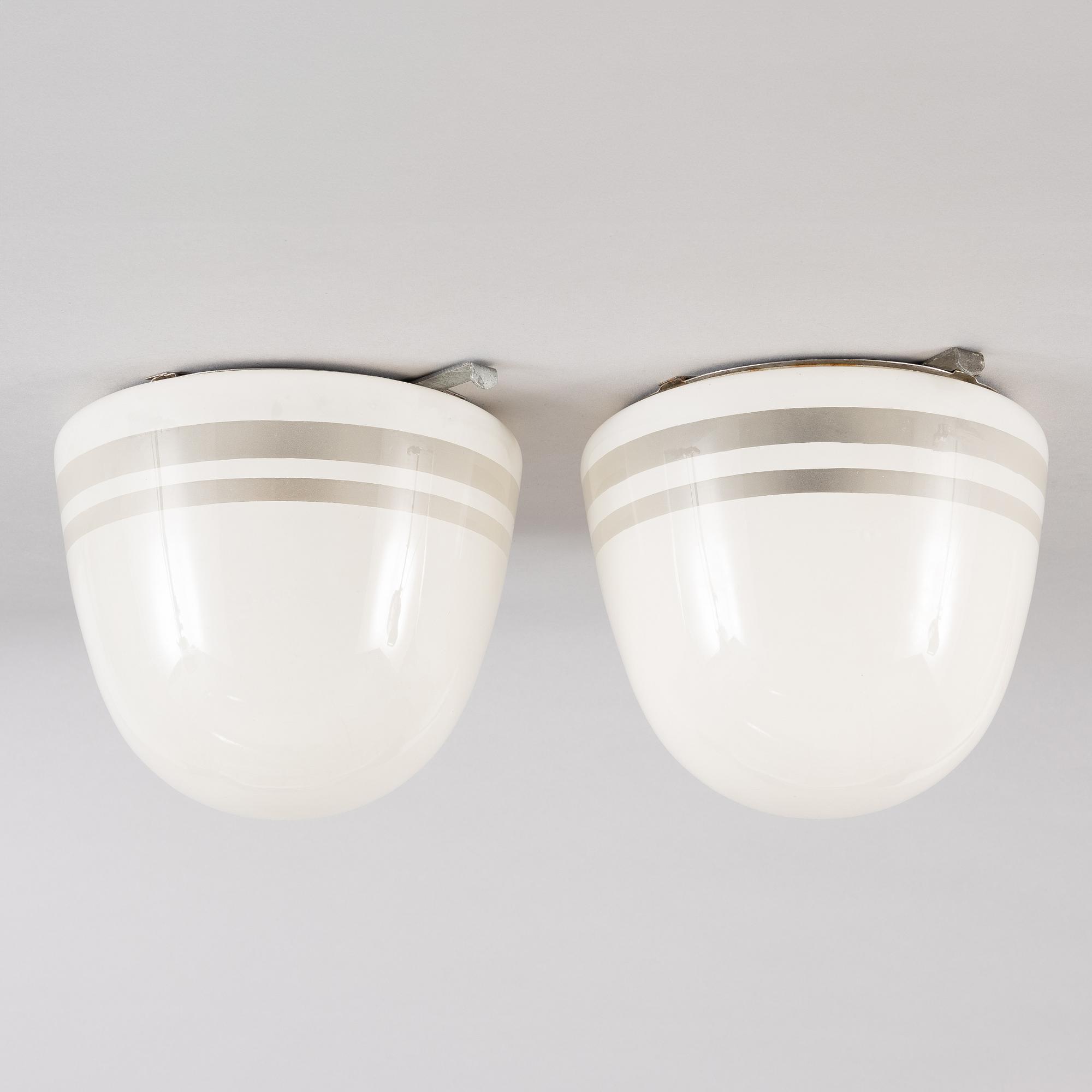 Harald Notini,  a pair of ceiling lamps, version of model "10148", Arvid Böhlmark's Lamp Factory, 1930s.