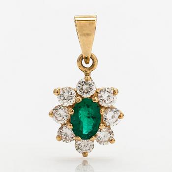 An 18K gold pendant with an emerald and diamonds ca. 0.56 ct in total.
