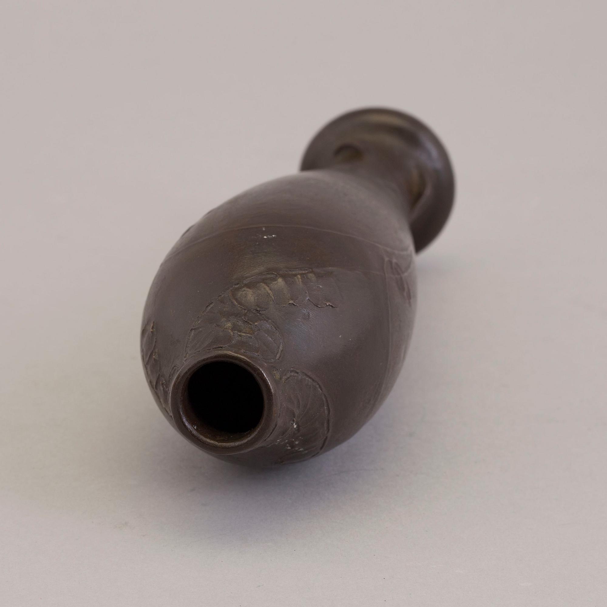 A signed early 20th century bronze vase by Hugo Elmqvist and G. Backlund.