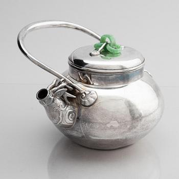 A silver tea pot with cover, Japan, early 20th century.