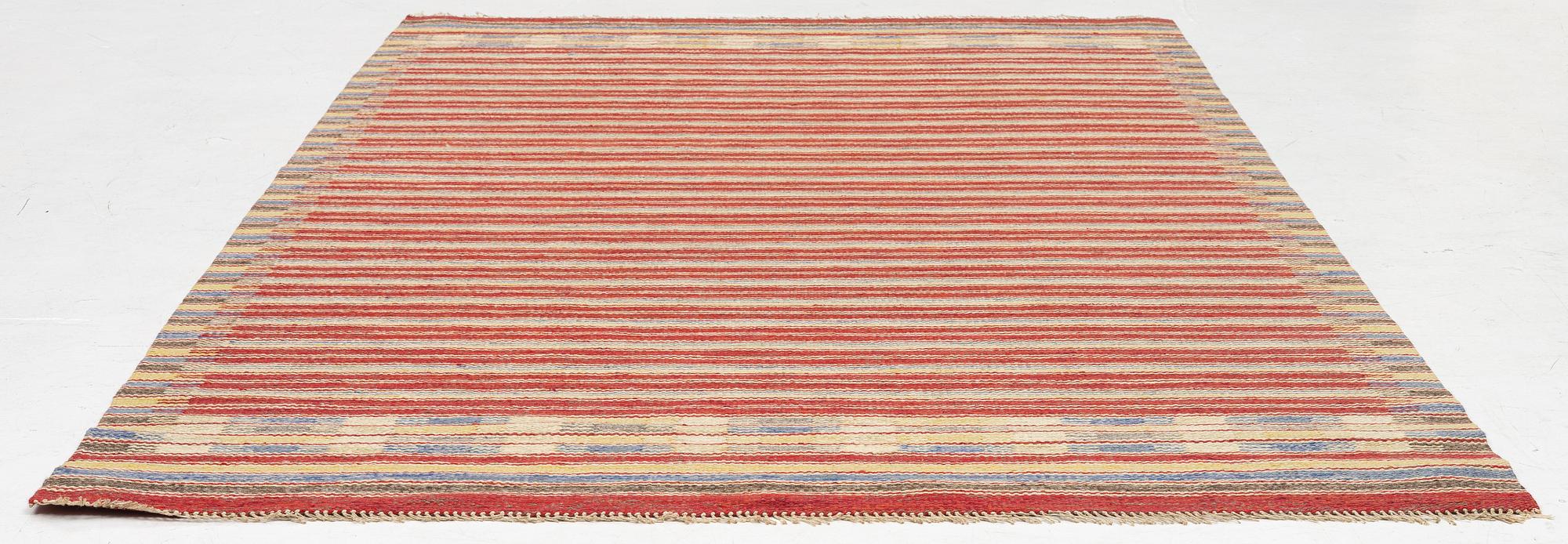 A flat weave carpet, c. 256 x 158 cm.