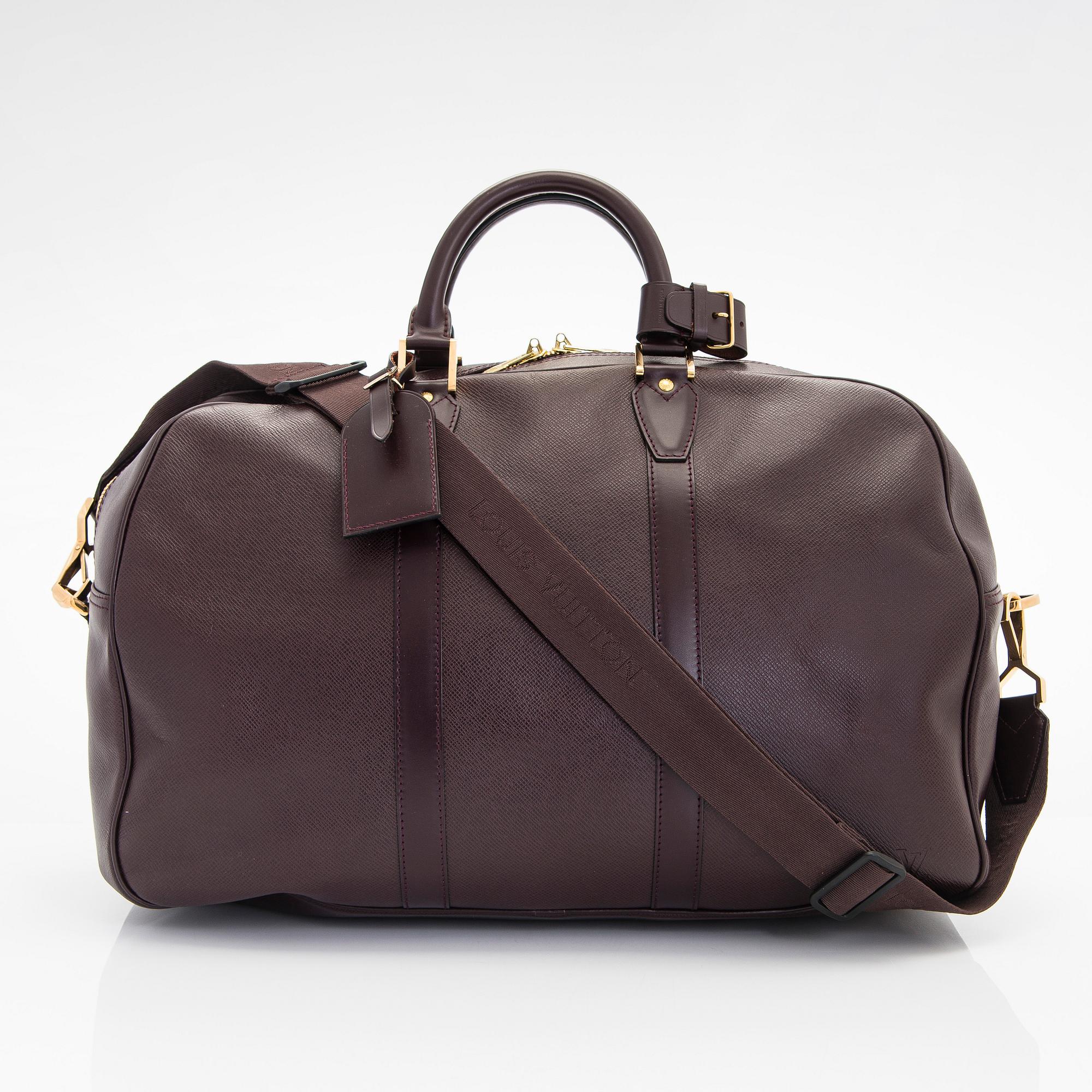 Louis Vuitton, a 'Taiga Kendall PM' weekend bag.