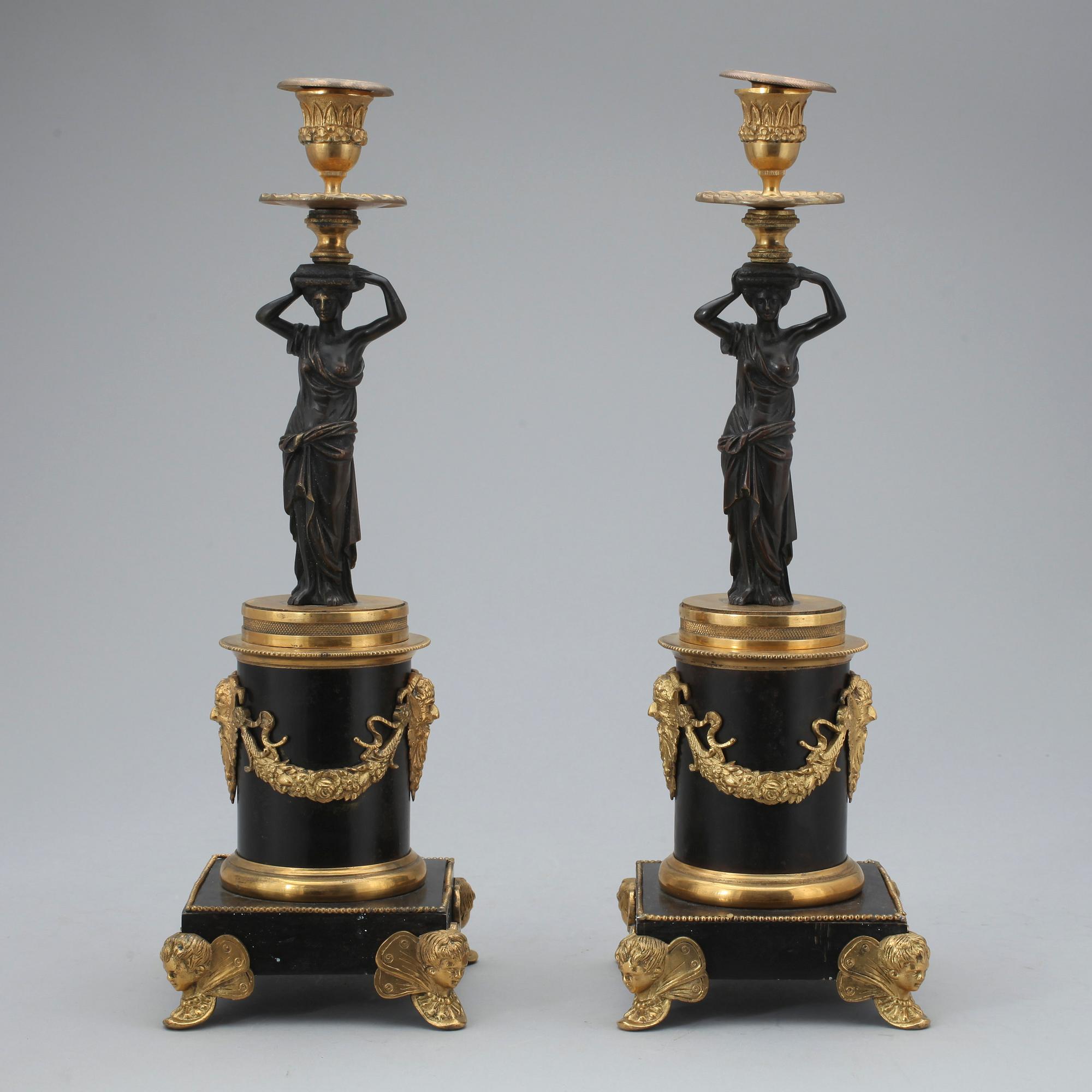 LJUSSTAKAR, ett par, empirestil, 1800-tal.