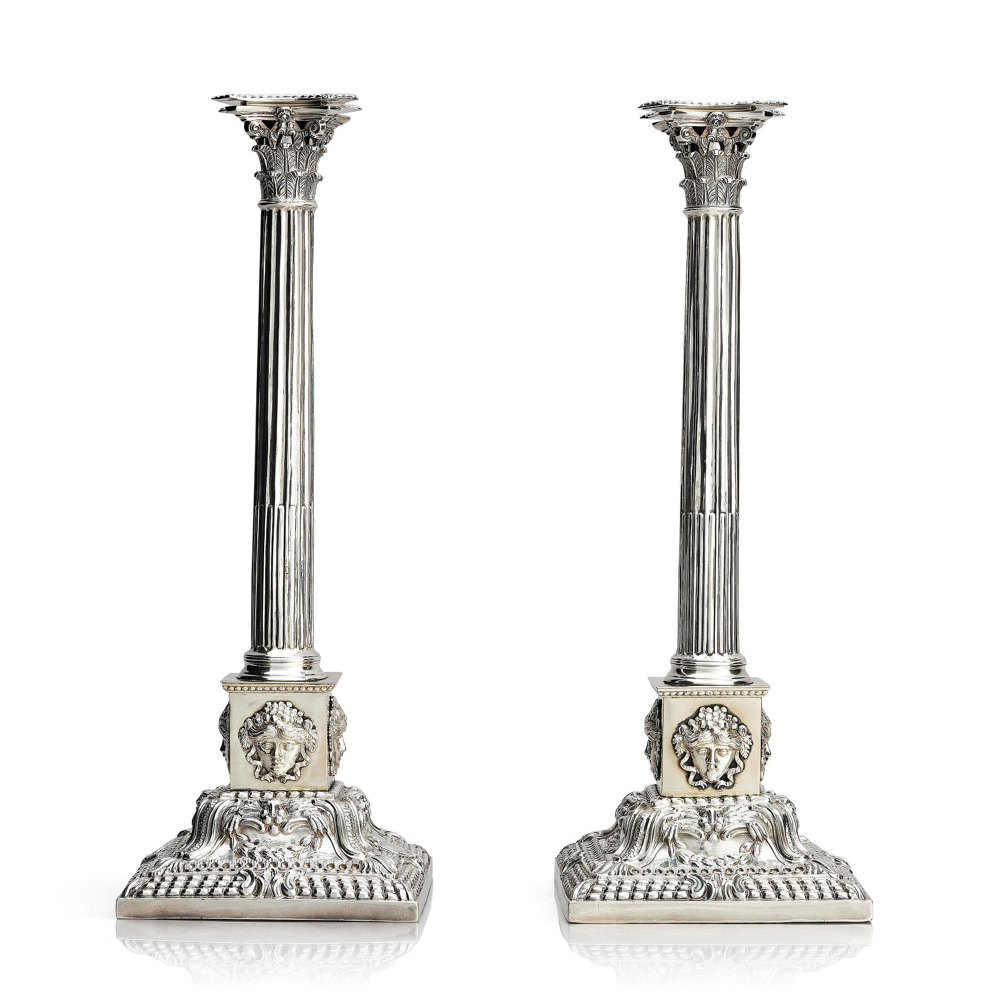 A pair of 18th century silver candlesticks, marks of Ebenezer Coker, London , possibly 1765.