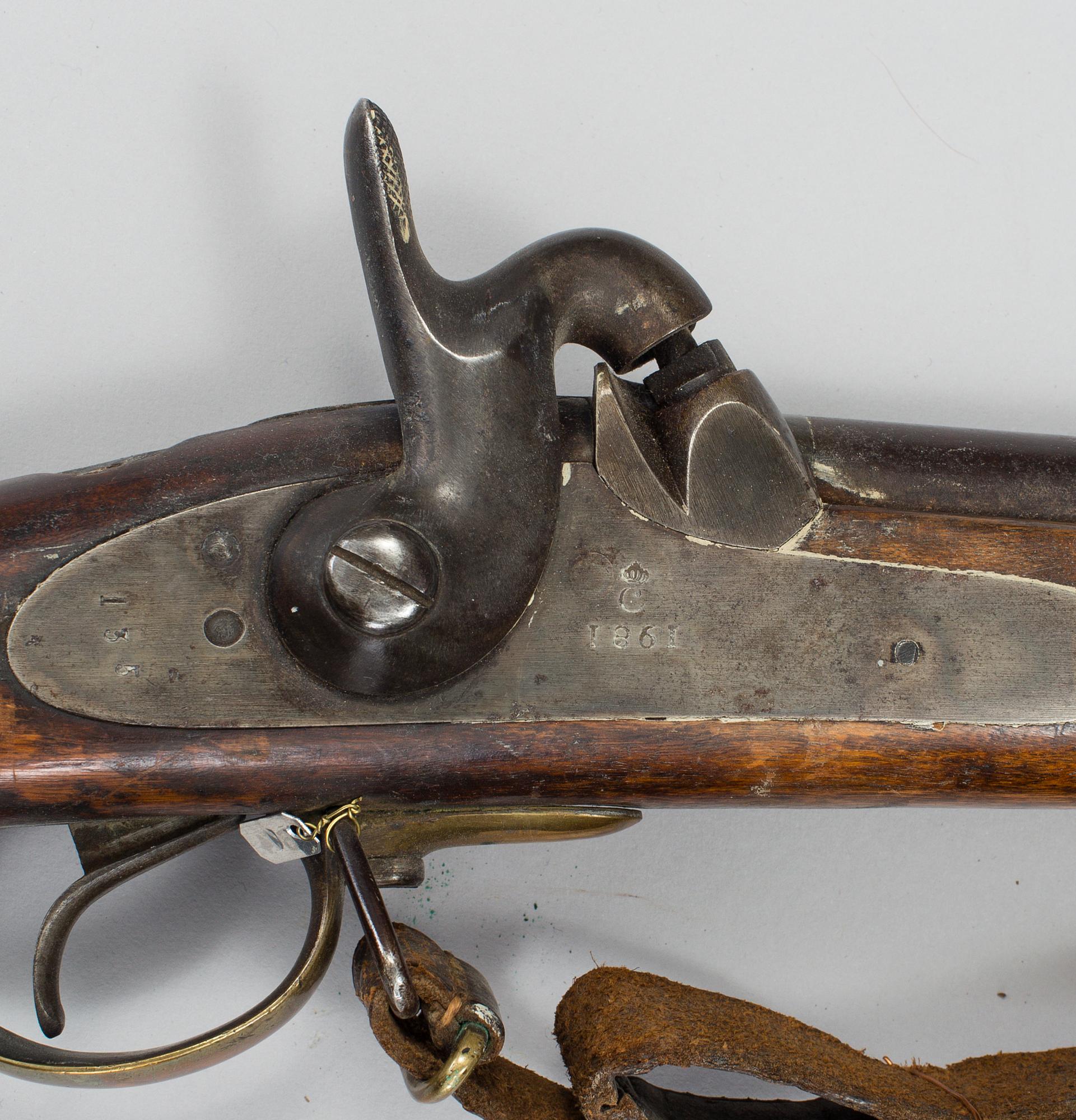 A Swedish 19h Century percussion rifle made by Carl Gustaf stads gevärsfaktori, dated 1851. With bayonet.