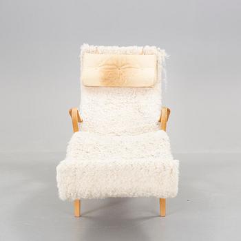 LIGGFÅTÖLJ, "Pernilla", brännmärkt Bruno Mathsson design.
