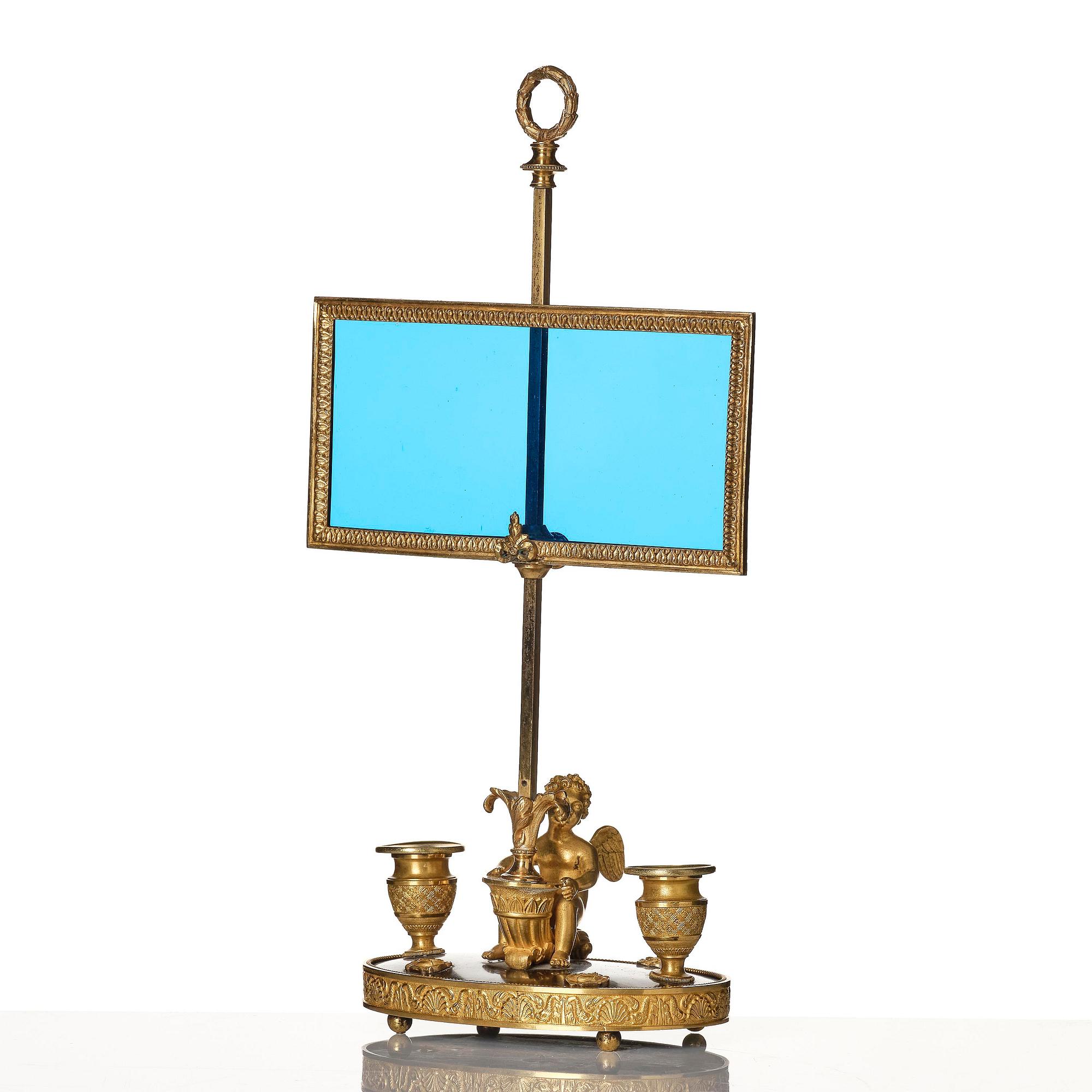 A Russian Empire ormolu and patinated bronse two-light lamp, early 19th century.