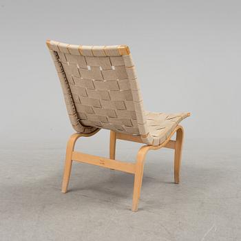 An 'Eva' easy chair by Bruno Mathsson, DUX, second half of the 20th century.