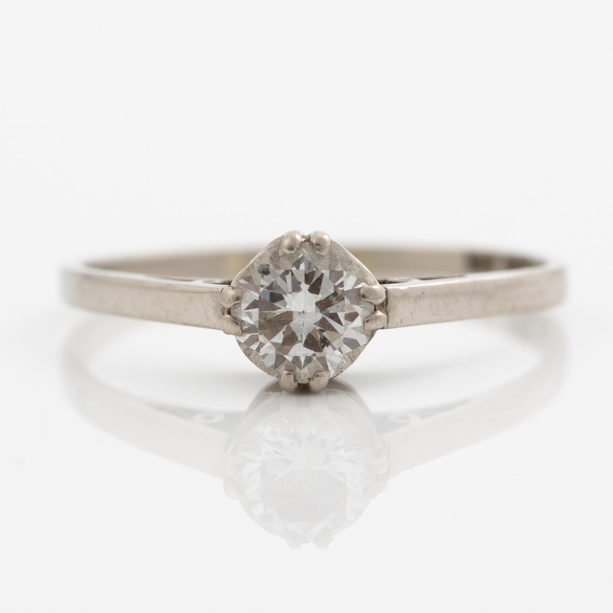 Ring, 18K white gold with brilliant-cut diamond.