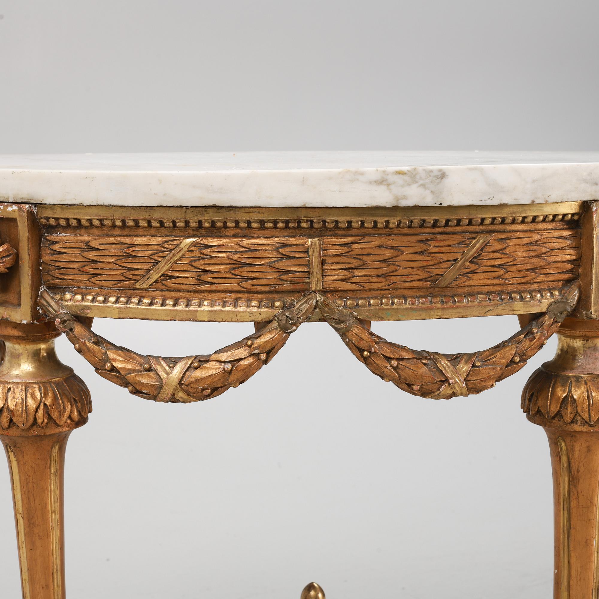 A Gustavian giltwood and marble console table, late 18th century.