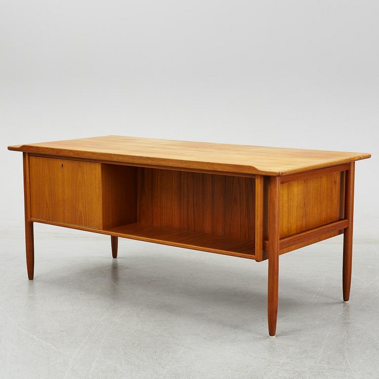 A 1950/60's teak writing desk.