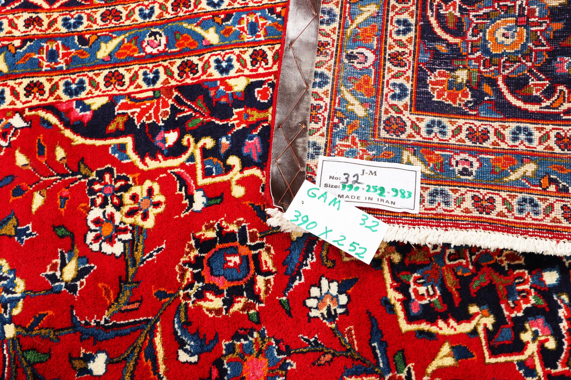 A Kashan carpet, c. 390 x 252 cm.