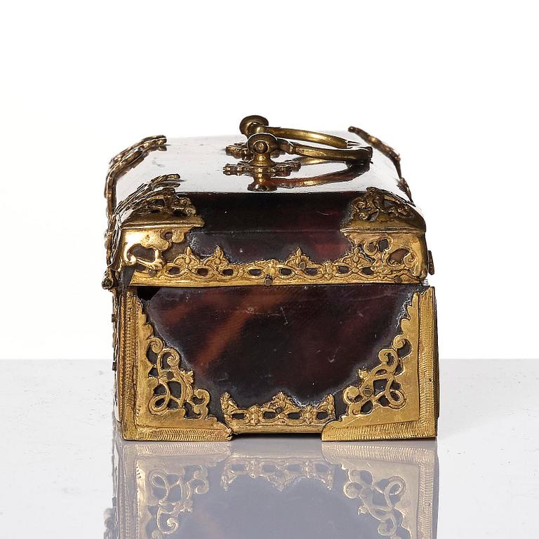 A baroque tortoise and gilt brass-mounted tobacco box, circa 1700.