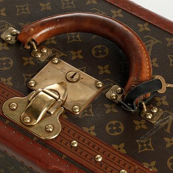 LOUIS VUITTON, a monogram canvas suitcase.