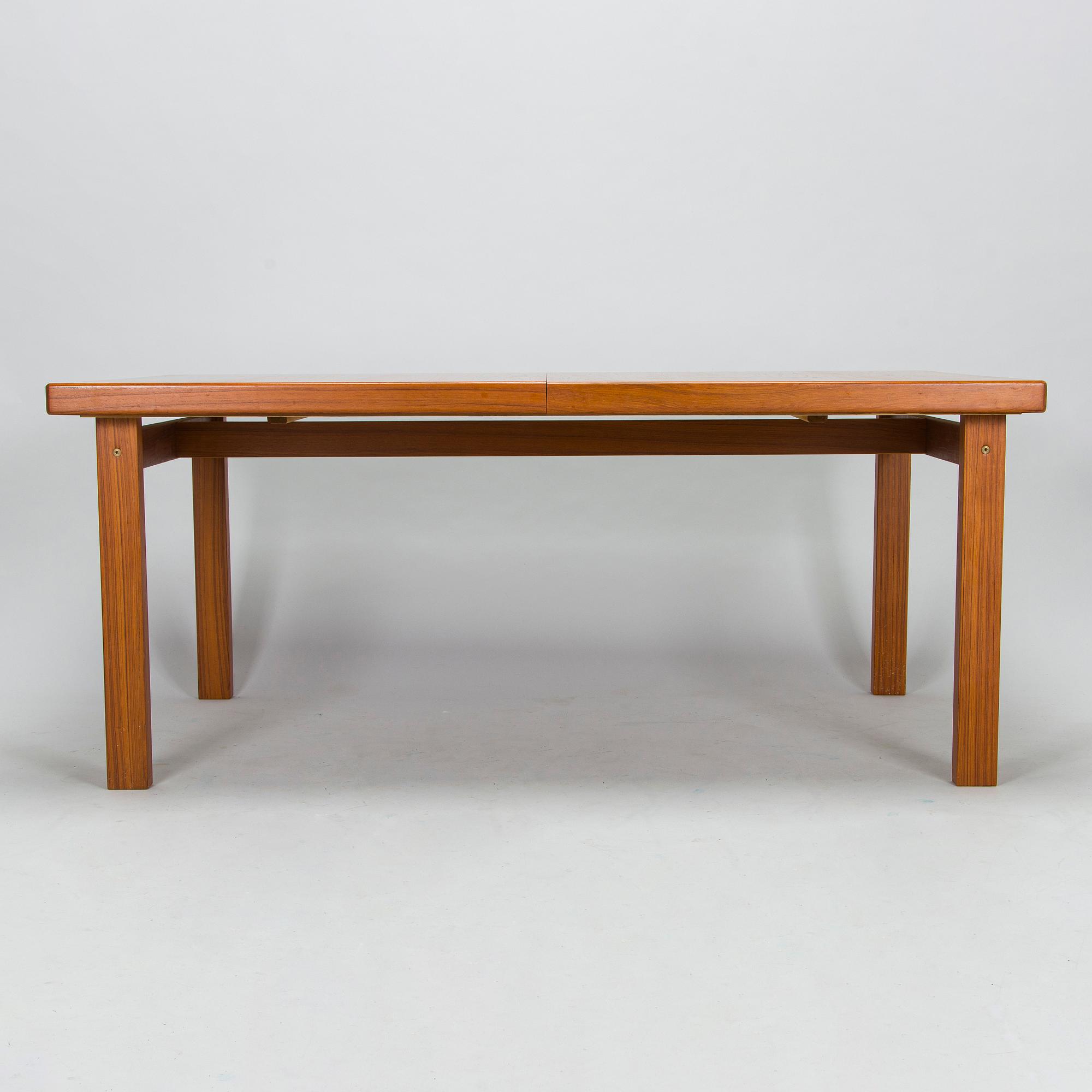 A mid-20th century dining table.