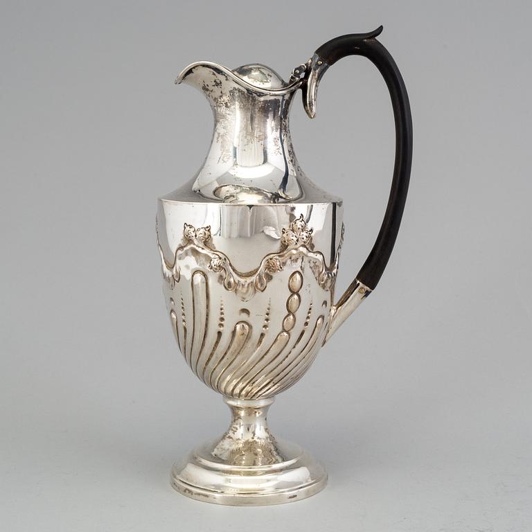 A silver jug by James Deakin & Sons, Sheffield, England, 1896. Weight 410 grams.