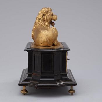 A rare gilt brass on ebonised base Lion Automaton figure clock, Augsburg circa 1630.