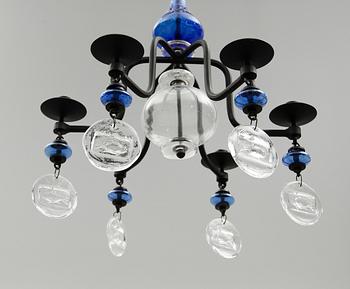 LJUSKRONA, smide och glas, Erik Höglund, 1900-talets andra hälft. Höjd ca 60 cm.