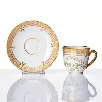 A set of 3 Royal Copenhagen 'Flora Danica' coffee cups with stands and 5 small dishes, Denmark, 20th Century.