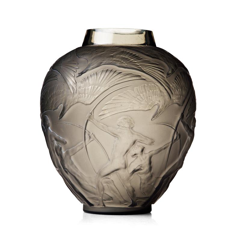 René Lalique, an "Archers" moulded smoke-coloured glass vase, model nr 893, France, post 1921.