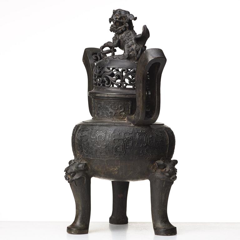 A large bronze censer with cover, presumably late Ming dynasty (1368-1644).