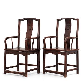 A pair of Chinese hardwood chairs, late Ming dynasty.