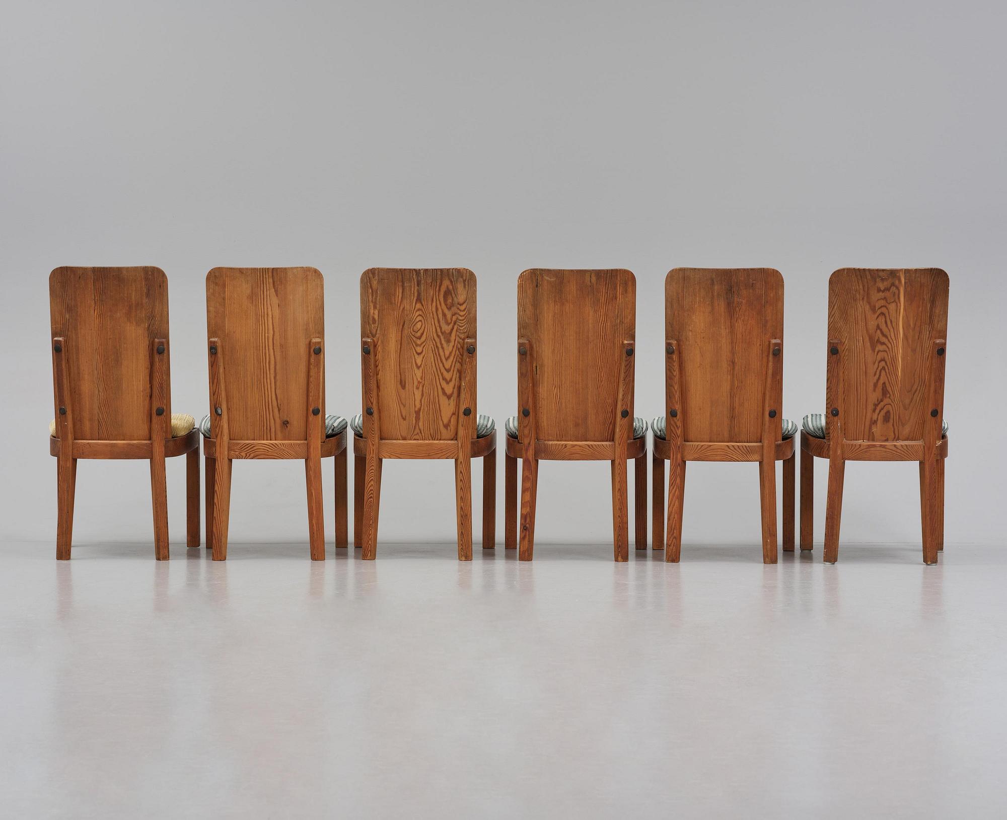 Axel Einar Hjorth, a set of six stained pine "Lovö" chairs, Nordiska Kompaniet, Sweden, 1930s.