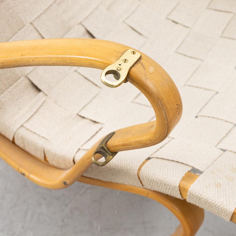 Bruno Mathsson, a 'Pernilla' armchair with ottoman, Firma Karl Mathsson, Värnamo.