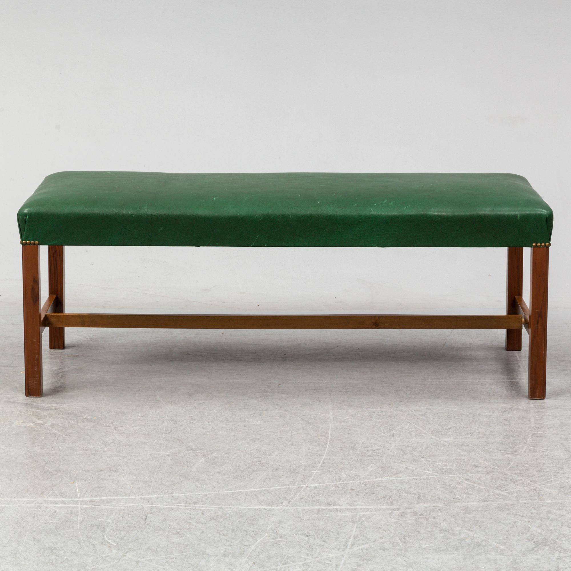 A bench "2082" by Josef Frank for Firma Svenskt Tenn.