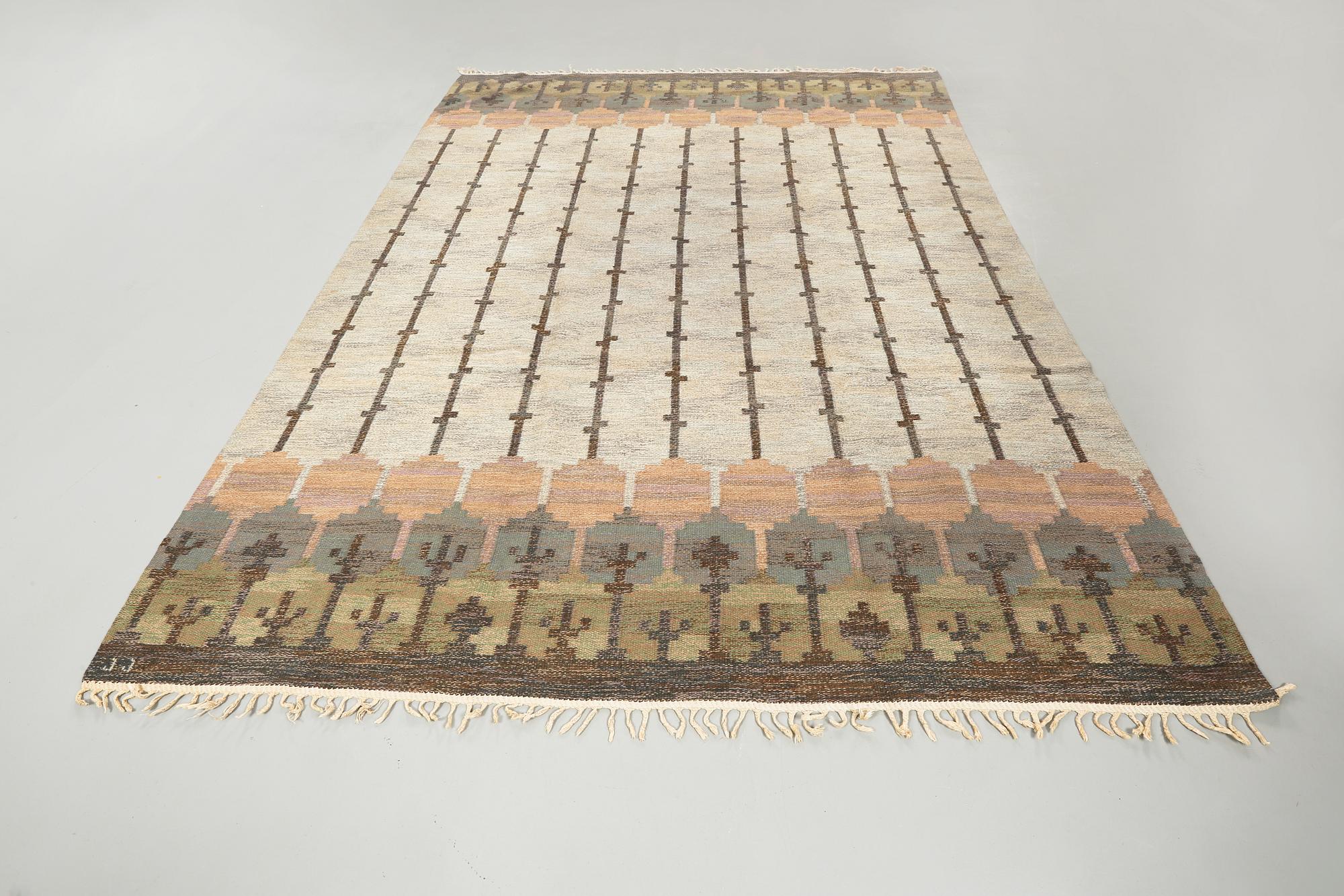 A flat weave by Judith Johansson, signed JJ, second half of the 20th century, 326 x 248 cm.