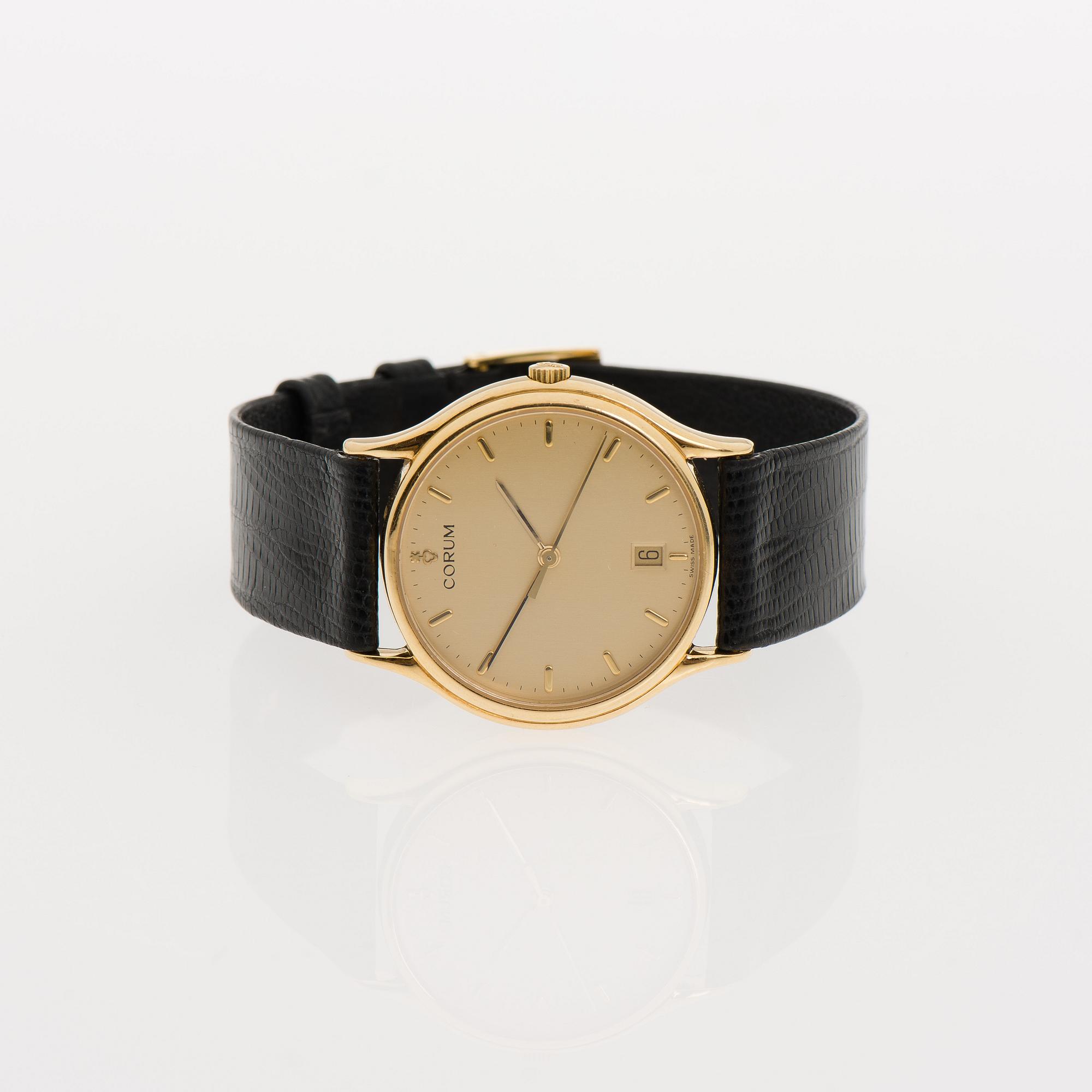 ARMBANDSUR, herr, Corum, 18K guld, original läderarmband. Garanti intyg 2007.