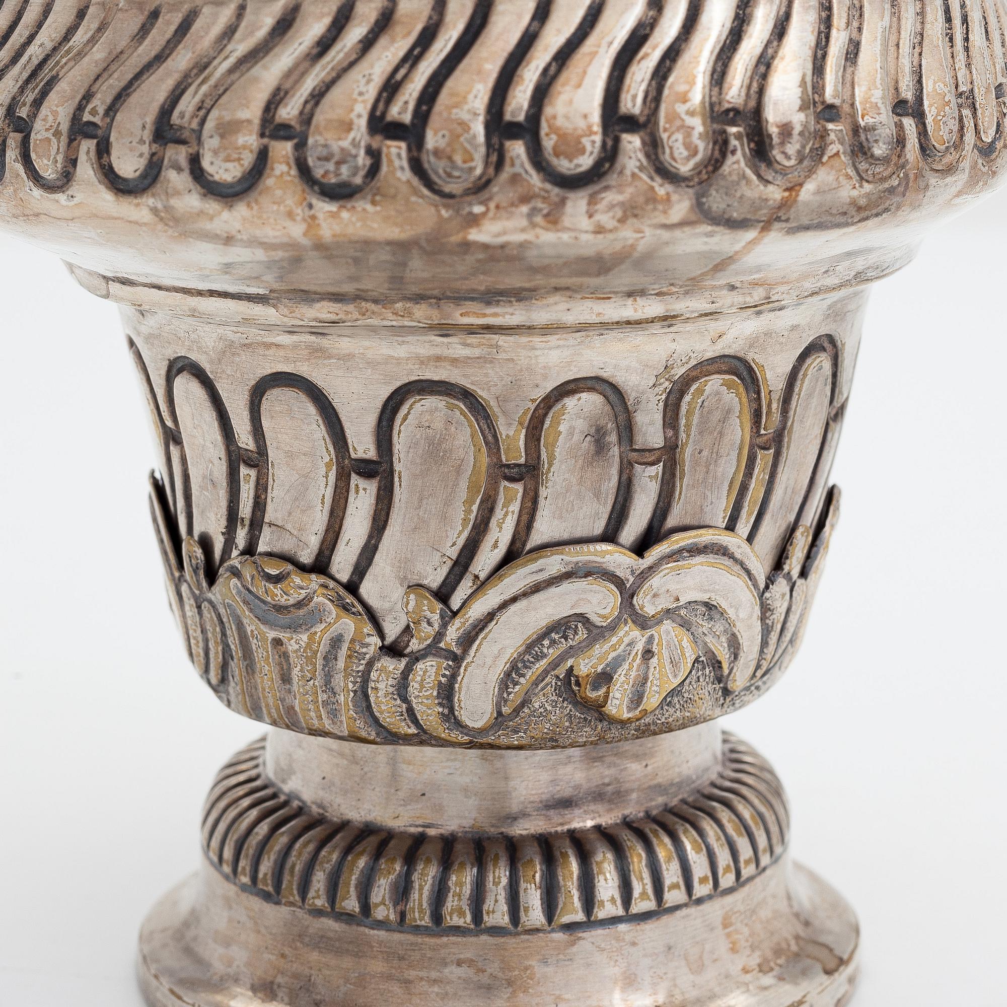 A silver plated brass Holy water bowl stamped L.G and dated 1774.