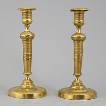 LJUSSTAKAR, ett par, Empire, mässing, 1800-talets mitt.