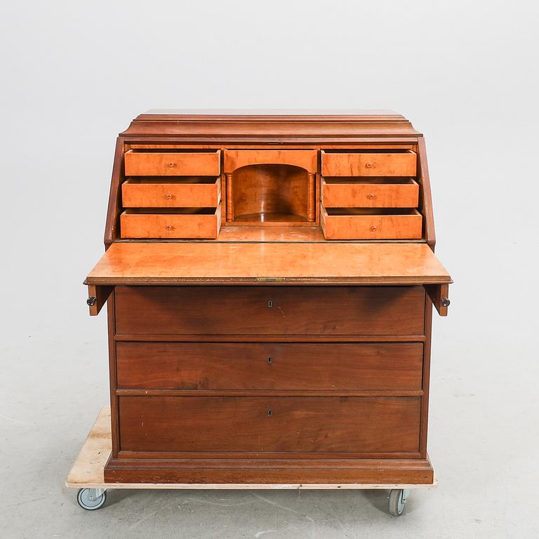 A mahogany flap secretaire first half of the 20th century.