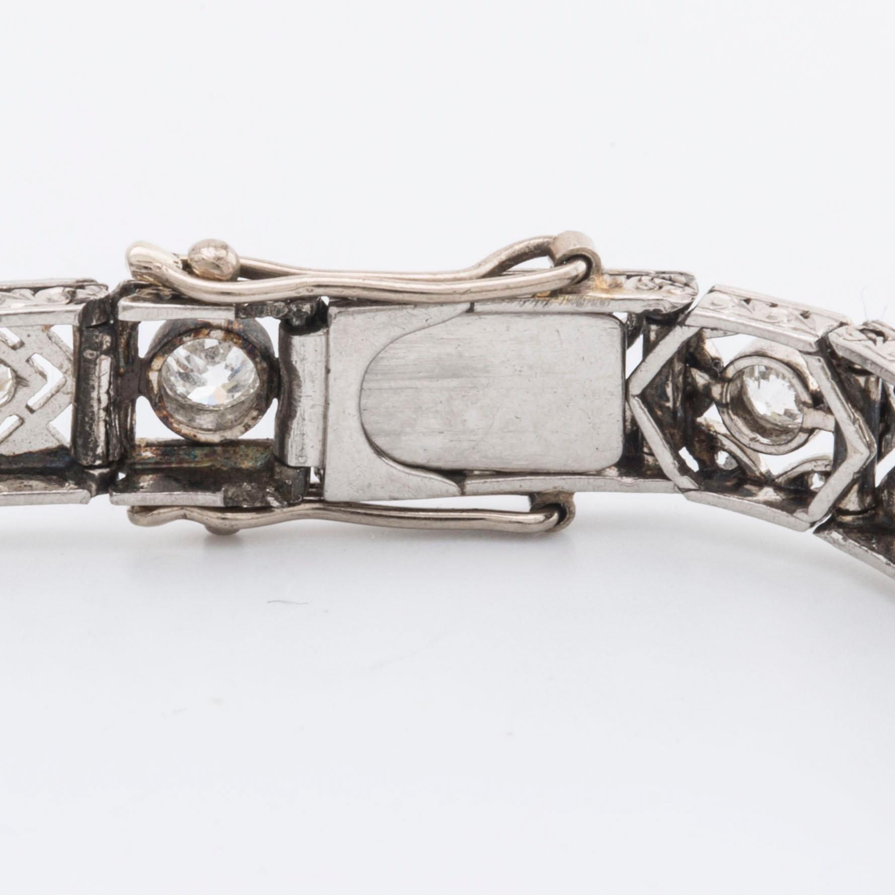 DIAMOND BRACELET, probably platinum, old and rose-cut diamonds approx 2 ct in total, 1 large stone not diamond.