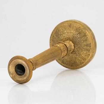 Ljusstake, brännförgylld brons, empire, 1800-talets första hälft.