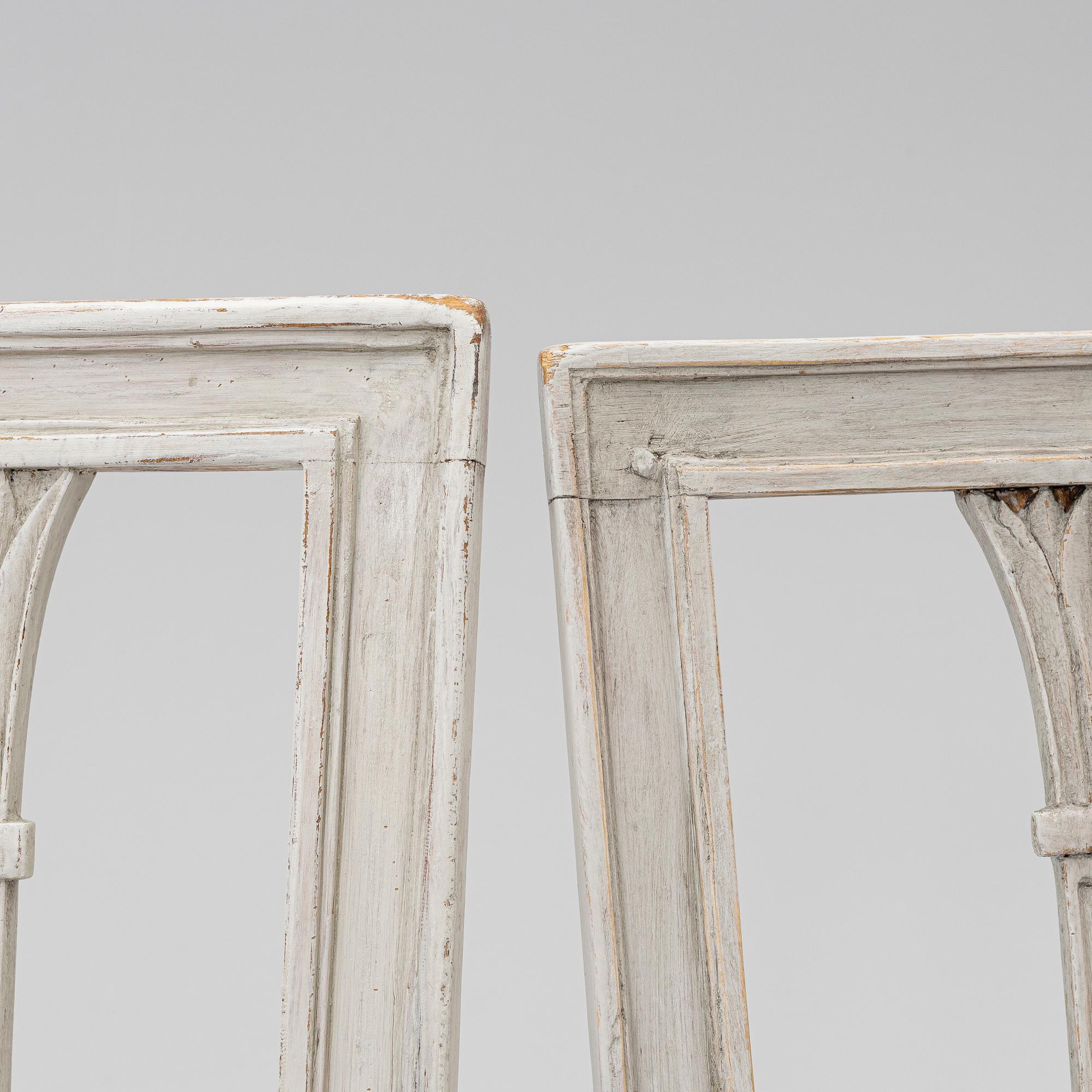 Three late Gustavian chairs, circa 1800. And one chair, late Gustavian style, 20th century.