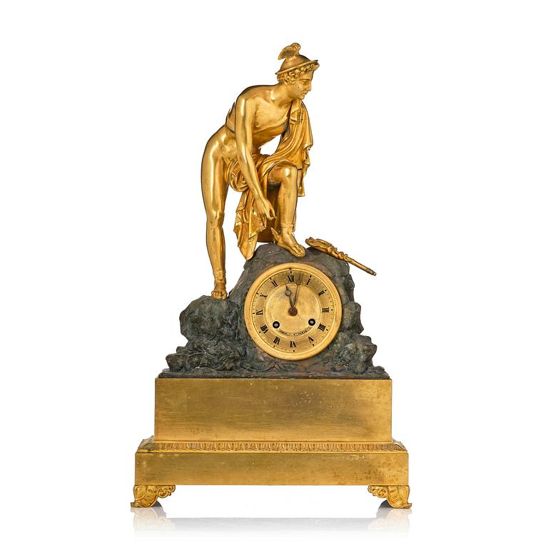 A French Empire ormolu and patinated bronze mantel clock, Paris, early 19th century.