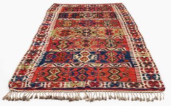 An antique southeast Anatolian kilim, c. 412 x 163 cm.
