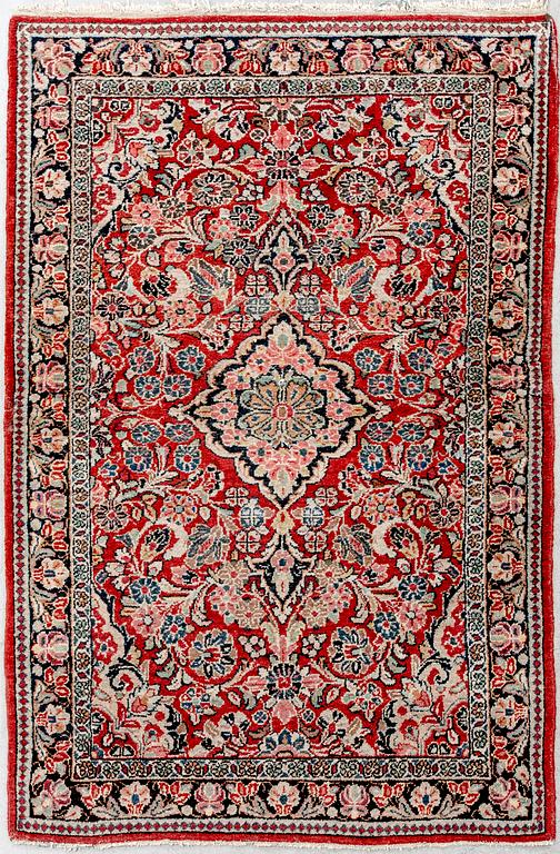 A semaitnique Sarouk carpet ca 204x128 cm.