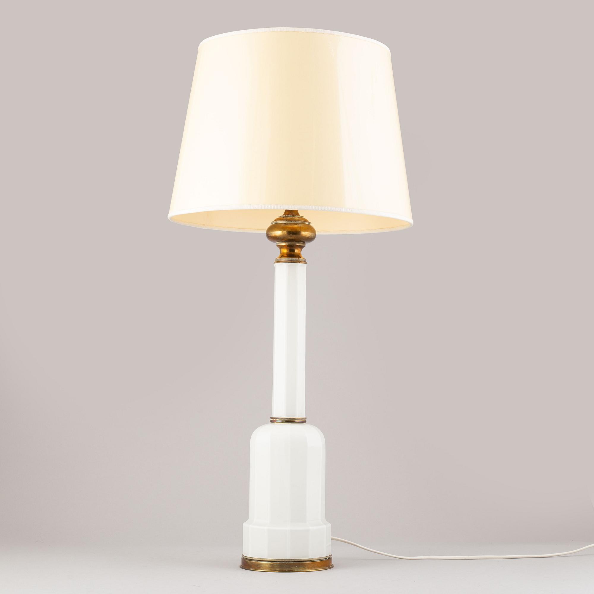 A glass and brass table lamp, mid/second half of the 20th century.